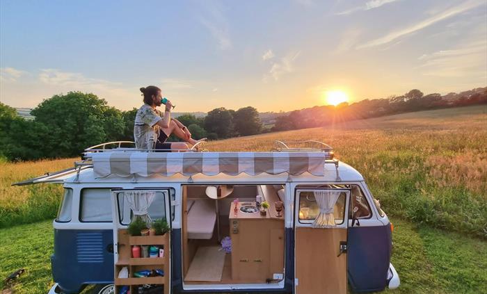 Enioy the sunsets from our secluded camper van pitches positioned in their own wildflower meadow.
